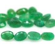Rich emerald green 7.71ct 17pc Emerald set