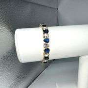 18 Kt Gold Plated Huge 32.5 Ctw Lab Simulated Diamond and Midnight Blue Sapphire Tennis Bracelet