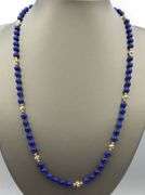 Lapis and gold beads station necklace