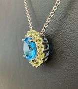 Sterling Silver Blue Topaz & Peridot Halo Pendant Necklace – Elegant Sparkling Design
