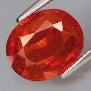 Impressive 6.89ct UNTREATED top red orange Spessartite Garnet