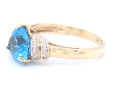 9kt Yellow gold 3ct Trillion swiss blue topaz and diamond accent ring