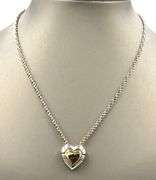 Tiffany & Co puzzle heart necklace