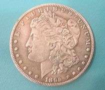 NOVELTY TWO HEAD COIN