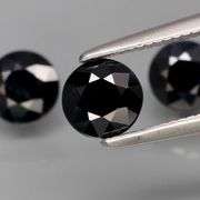 Heated Only! 2.57ct diamond cut black Sapphire set!