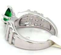 Green marquise and white round and baguette cubic zirconia ring