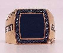 Men's 14kt Solid Yellow Gold, Onyx, & CZ VERSACE Ring. Total weight: 6.80 grams