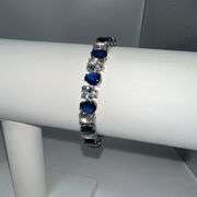 18 Kt White Gold Plated Huge 32.5 Ctw Lab Simulated Diamond and Midnight Blue Sapphire Tennis Bracel