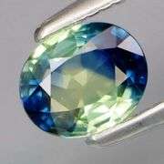 Strong color seperation! .52ct blue and yellow Parti Sapphire! Heated only!
