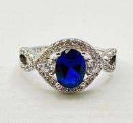 925 Sterling Silver Oval Blue Center Stone With Crystal Pave Details Ring