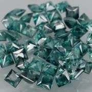 Multi-hue 5.42ct natural blue green Sapphire set