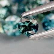 Multi-hue 3.77ct natural blue green Sapphire set