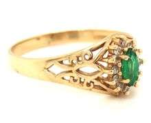 14kt Yellow gold marquise emerald and diamond ring
