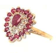 10kt Yellow gold pear shaped and round ruby and diamond accent ring