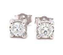 One pair of 14kt white gold 0.60ctw Illusion set diamond stud earrings