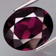 Black plum color! VS clarity! 5.46ct Mozambique Garnet!