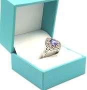 Elegant 1.17CTS Pear Shaped Tanzanite and 0.40CTW Diamond Ring in 14KT White Gold Over Sterling Silv