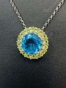 Sterling Silver Blue Topaz & Peridot Halo Pendant Necklace – Elegant Sparkling Design