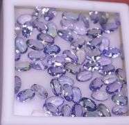 Untreated! Glittering 13.65ct oval cut Tanzanite set!