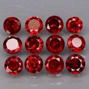 Outstanding 6.45ct diamond cut VS grade high fire Mozambique Garnet set