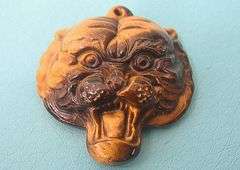 TIGER PENDANT HAND CARVED FROM TIGER EYE