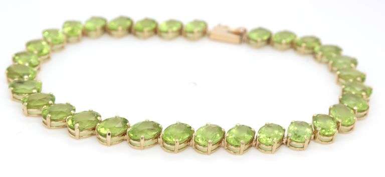 14kt Yellow gold 27.50ctw oval peridot bracelet