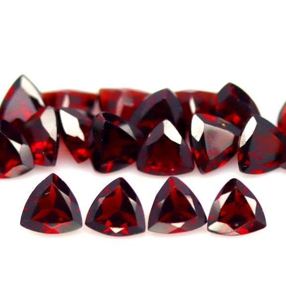 Deep burgundy 10.90ct trillion cut untreated Garnet set