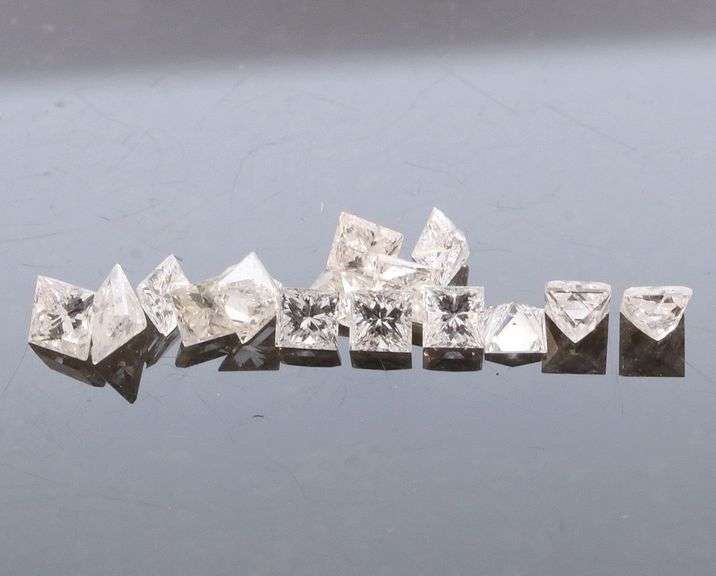 Glittering! Full .77ct set of princess cut Diamonds!