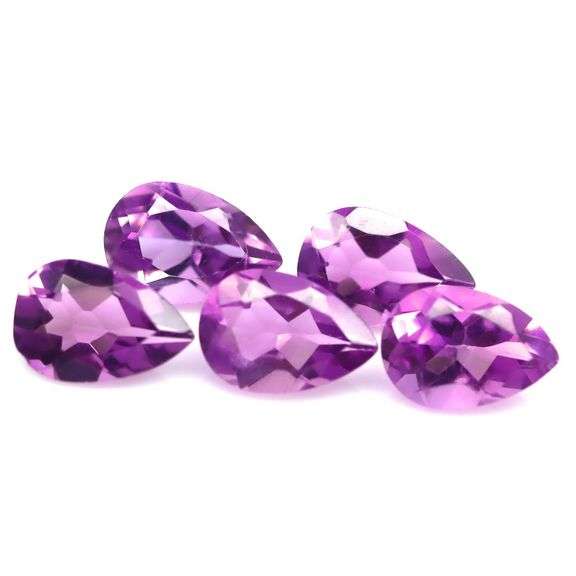 Eye catching 14ct matched bright purple Amethyst set