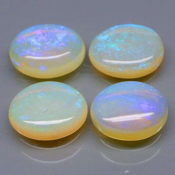 Neon flashing 7.21ct set of untreated Opals