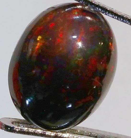 Glistening 1.89ct smoldering Black Opal