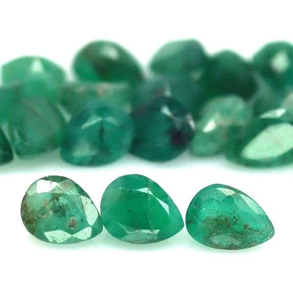 Rich green unheated 9.45ct Zambian Emerald set