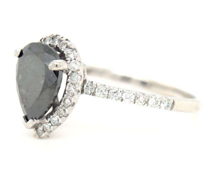 14kt White gold pear shaped black diamond in diamond halo ring