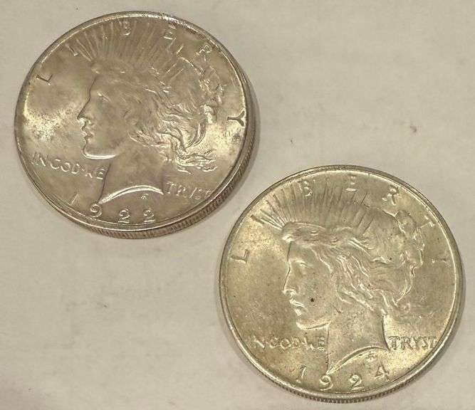 1922 &1924 Frosty White BU Peace Dollars.