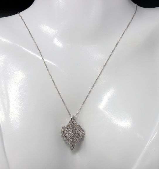 10kt White gold diamond cluster swirl pendant on chain