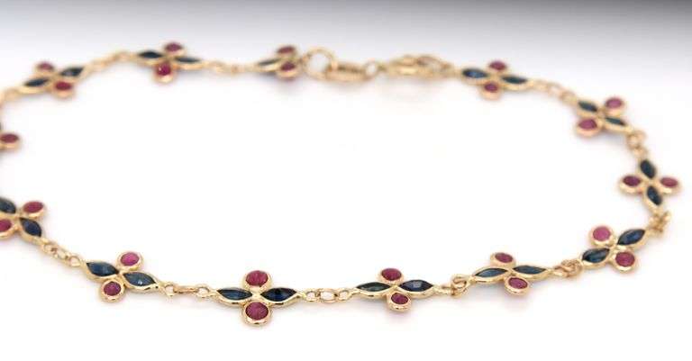 14kt Yellow gold ruby and sapphire bezel set bracelet