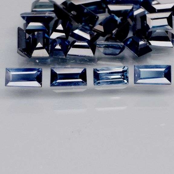 Heated only! Heavy 4.34ct deep blue sapphire set