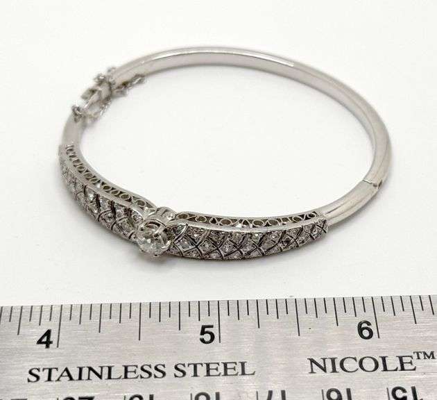 Fantastic diamond bangle in 14k white gold , size 2.5 x2.0 inch