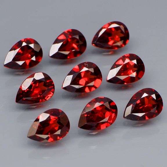 Premium 7.08ct pear cut cherry red Garnet set