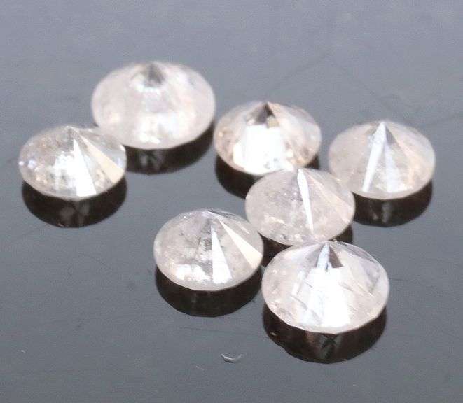 Sparkling .43ct set of round brilliant Diamonds!