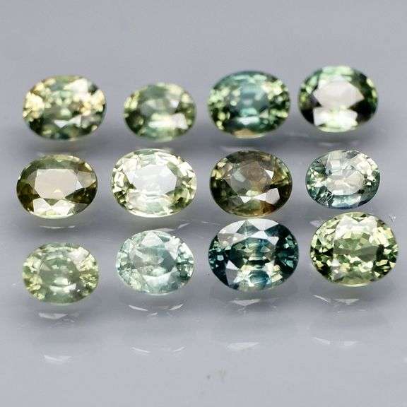 Awesome 3.43ct oval cut GREEN Sapphire set