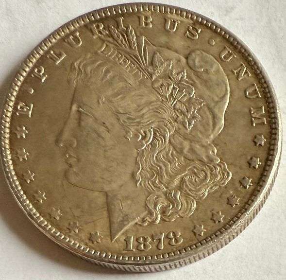 Solid 1878 7 Tail Feathers Morgan Dollar