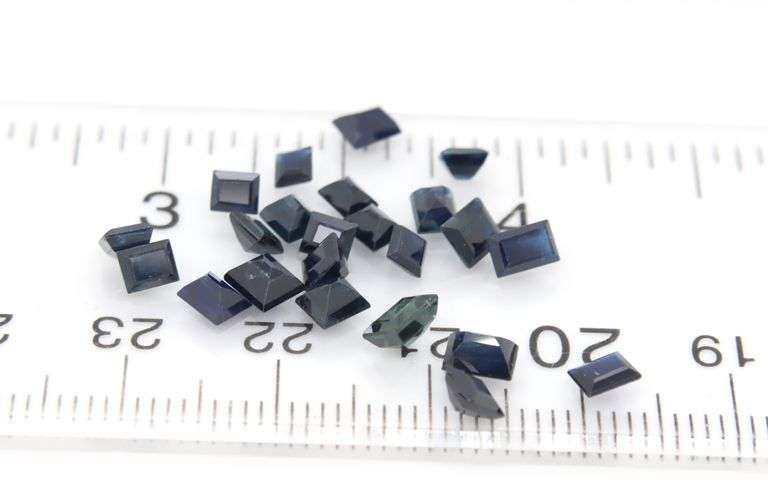 Serious 83.26ct dark blue baguette cut Sapphire set