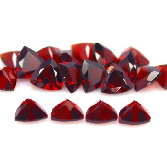 Deep burgundy 10.62ct trillion cut untreated Garnet set