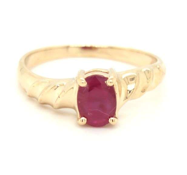 14kt Yellow gold oval ruby twisted shank ring