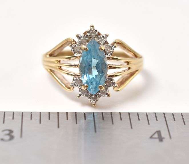 Tasteful Topaz and Diamond Ring in 10K Yellow Gold