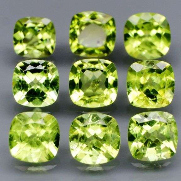 High fire 5.43ct 5mm cushion cut Peridot set