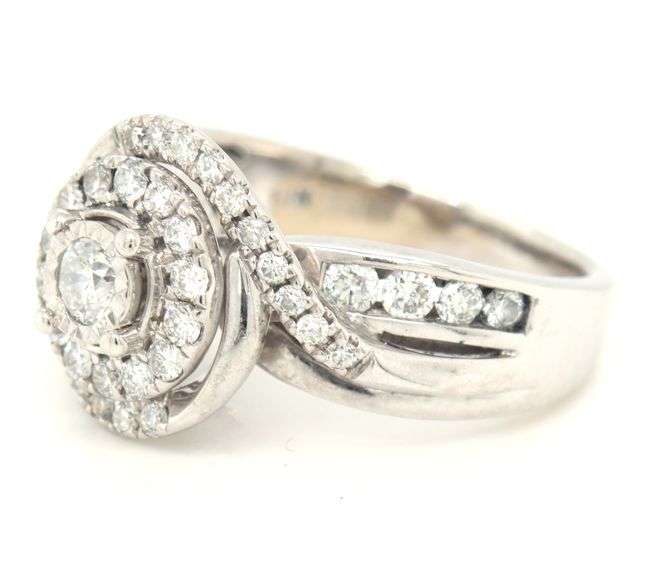 14kt White gold 0.95ctw diamond swirl halo engagement ring