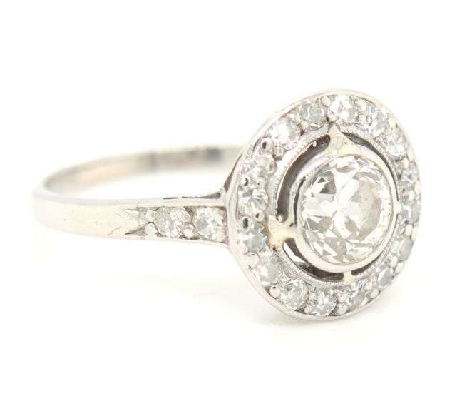 Platinum 0.50ctw European cut halo diamond ring
