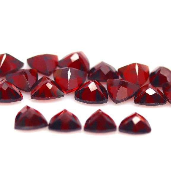 Deep burgundy 10.90ct trillion cut untreated Garnet set
